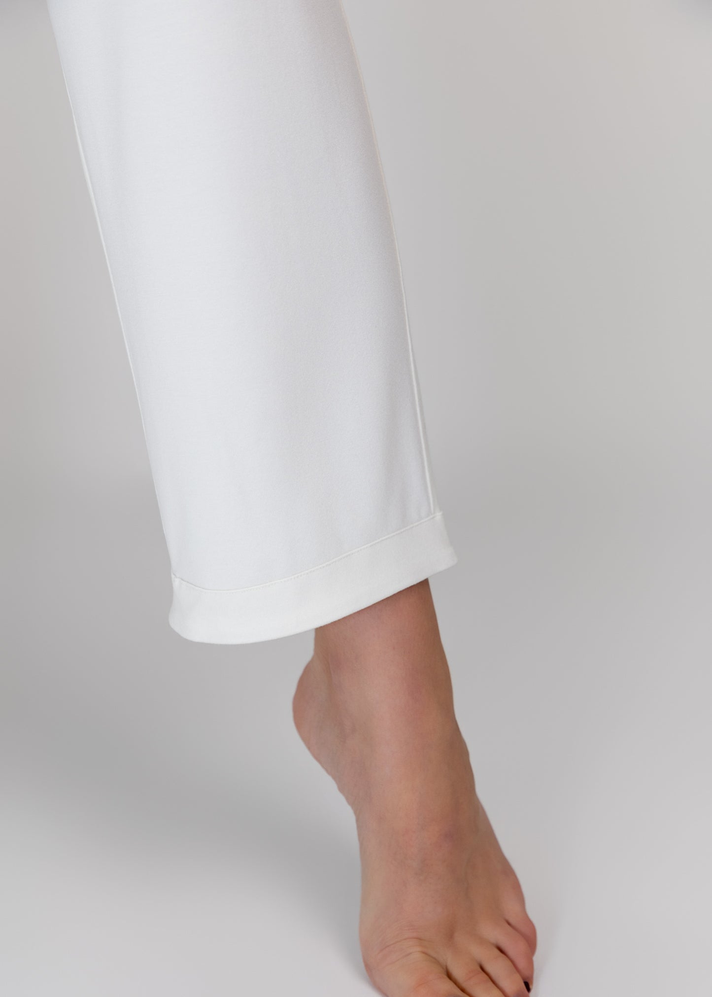 White loungewear pants fold detail 